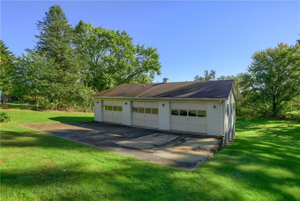 4126 Henderson Road Hickory, PA 15340 - Photo 3 of 25 a view of a house with a yard