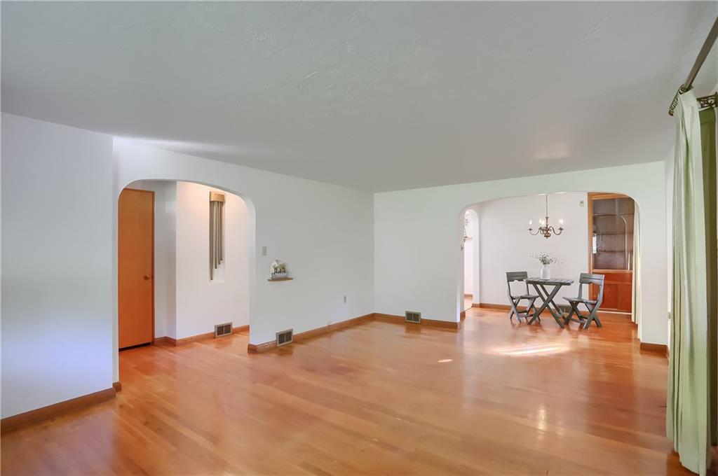 4126 Henderson Road Hickory, PA 15340 - Photo 6 of 25 a view of a livingroom with furniture and dining area