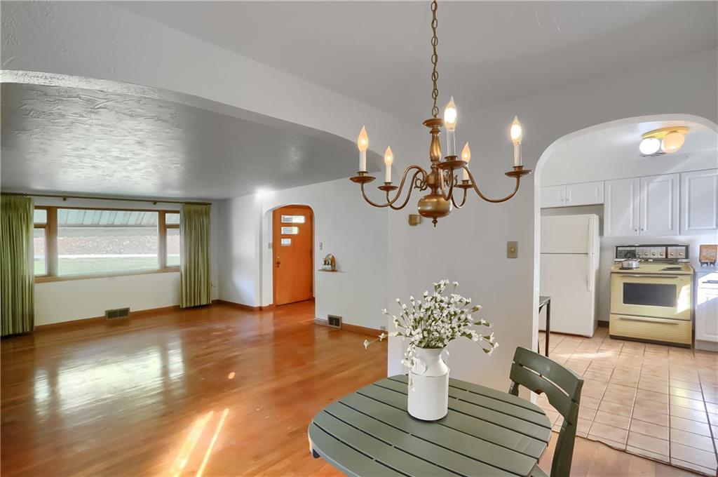 4126 Henderson Road Hickory, PA 15340 - Photo 10 of 25 a view of a dining room with furniture and wooden floor
