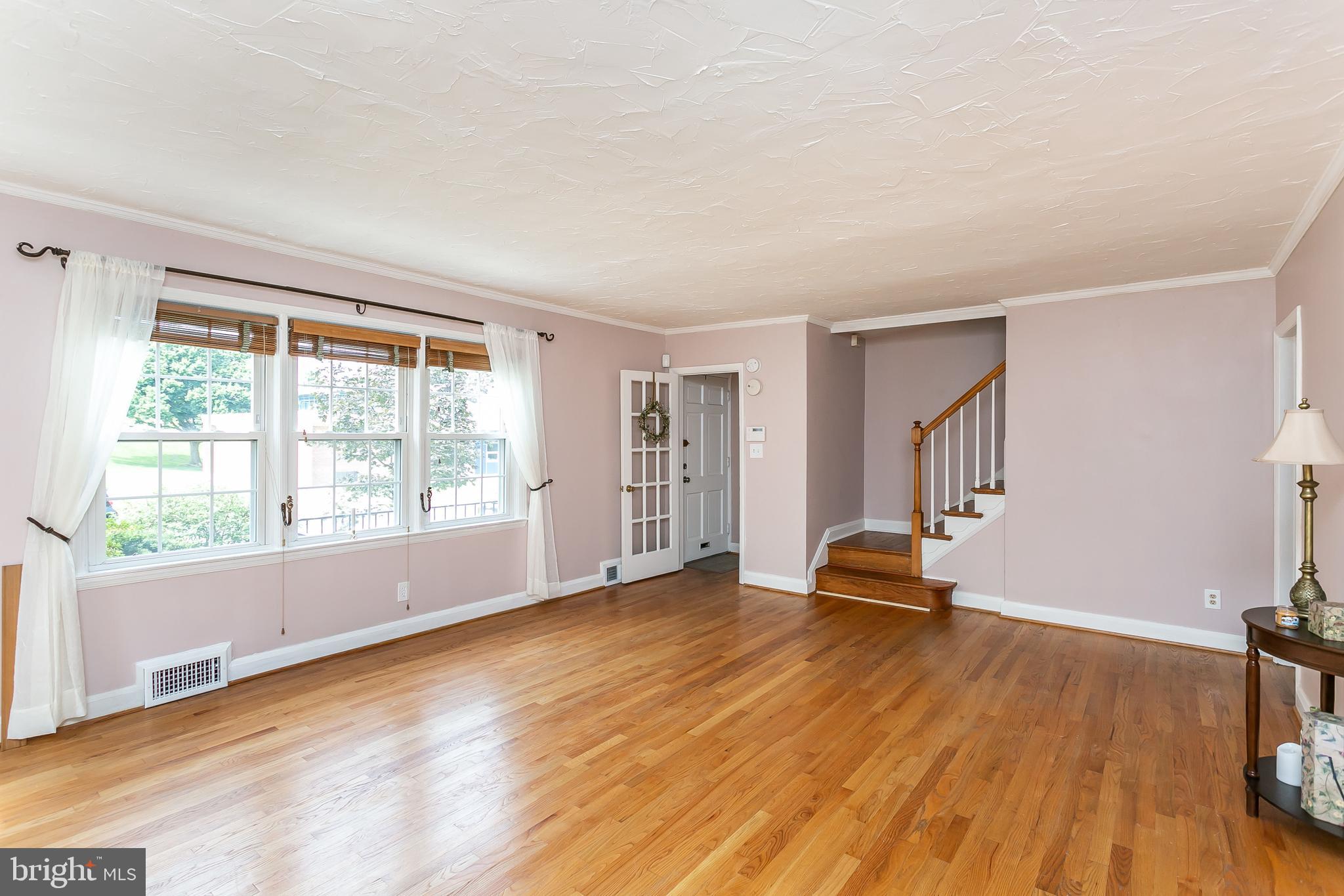 8233 Pleasant Plains Road Baltimore, MD 21286 - Photo 9 of 48 Main Level Living Room with beautiful hardwoods!