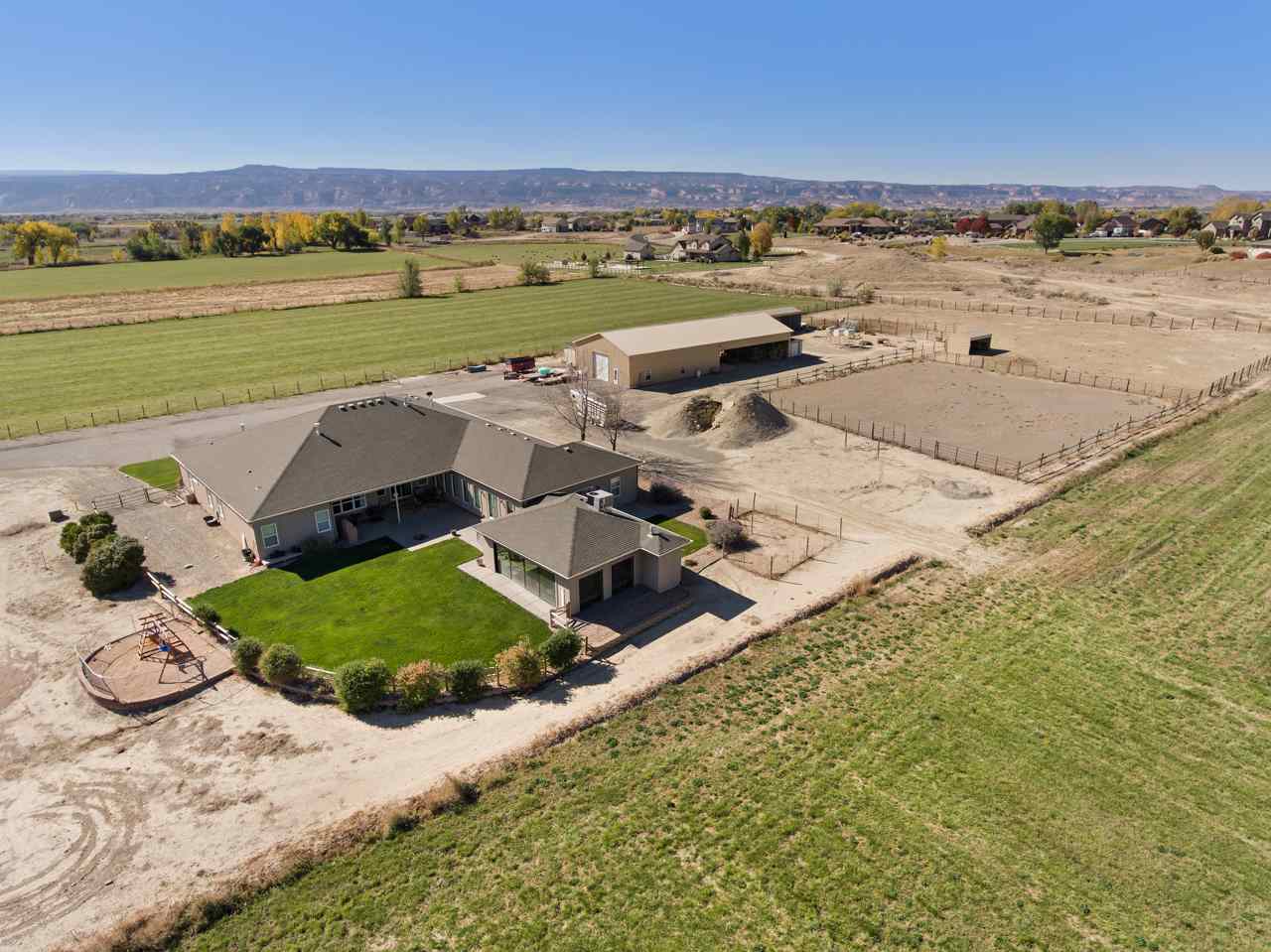 1421 19 Road Fruita, CO 81521 - Photo 12 of 36 an aerial view of a house with a ocean view