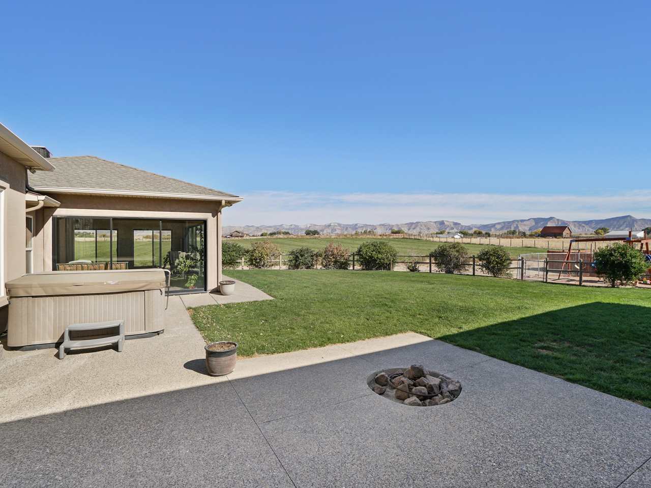 1421 19 Road Fruita, CO 81521 - Photo 5 of 36 a house view with a garden space