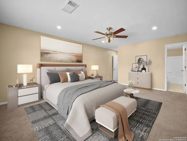 a bedroom with a bed and ceiling fan