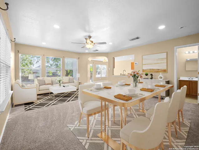 a view of a dining room with furniture window and outside view