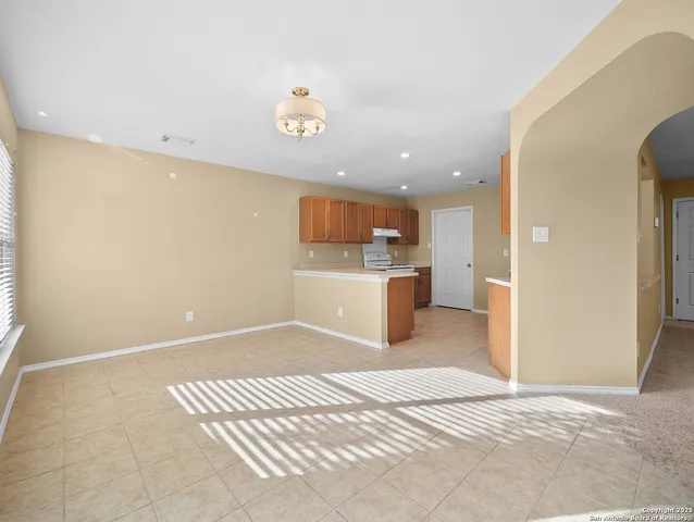 a view of kitchen and wooden floor