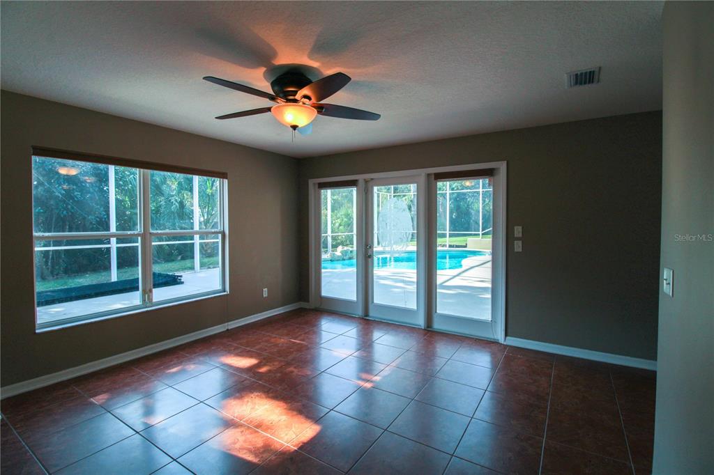 6065 Spruce Point Circle Port Orange, FL 32128 - Photo 22 of 33 a view of an empty room with a window