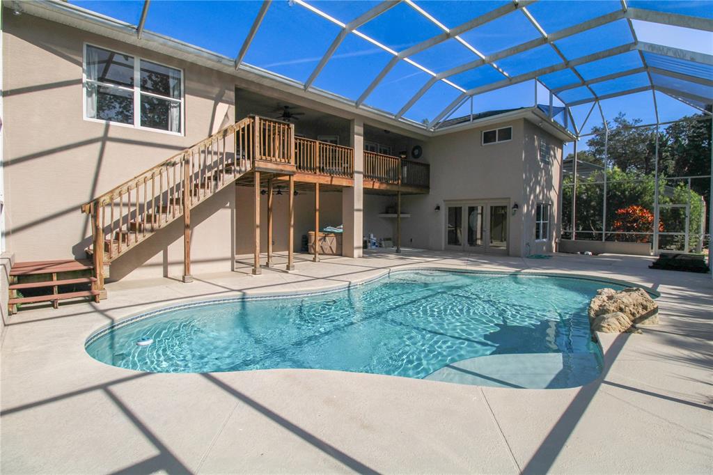 6065 Spruce Point Circle Port Orange, FL 32128 - Photo 26 of 33 a view of a house with a yard