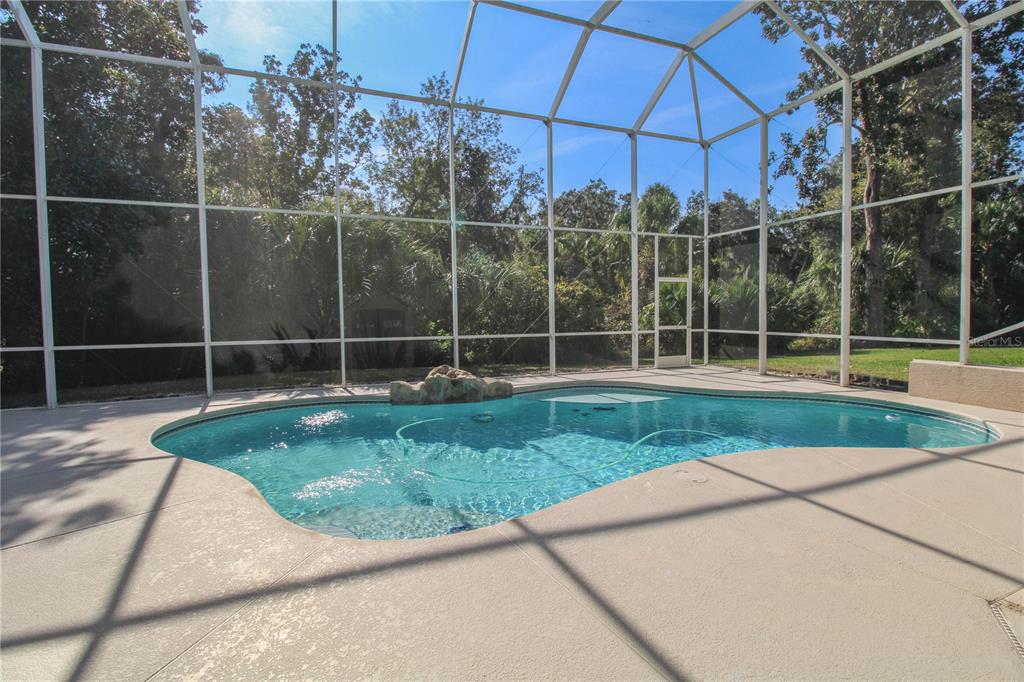 6065 Spruce Point Circle Port Orange, FL 32128 - Photo 27 of 33 a view of a room with a wooden floor and fence