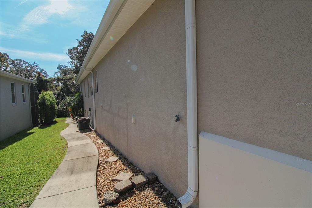 6065 Spruce Point Circle Port Orange, FL 32128 - Photo 32 of 33 a view of a pathway with a yard