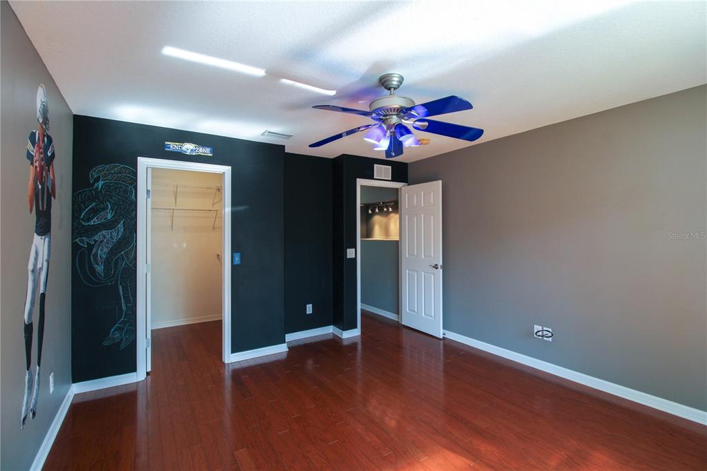 6065 Spruce Point Circle Port Orange, FL 32128 - Photo 9 of 33 wooden floor in an empty room