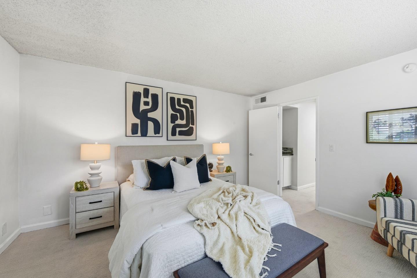 1485 De Rose Way, Unit 123 San Jose, CA 95126 - Photo 11 of 21 a bedroom with a bed and a couch