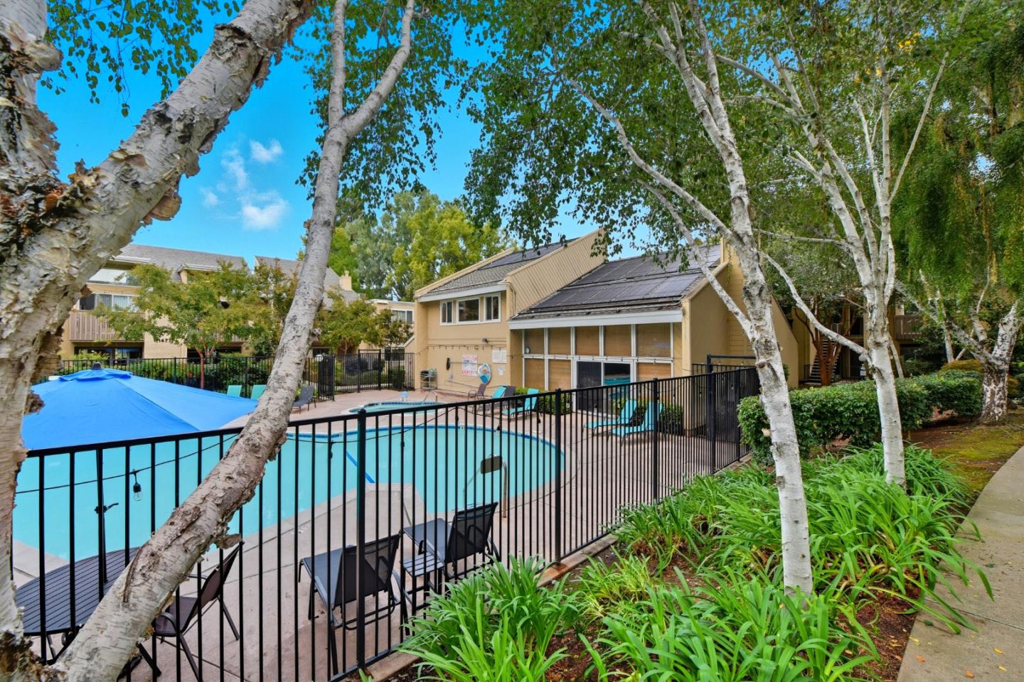 1485 De Rose Way, Unit 123 San Jose, CA 95126 - Photo 20 of 21 a view of a house with backyard and porch