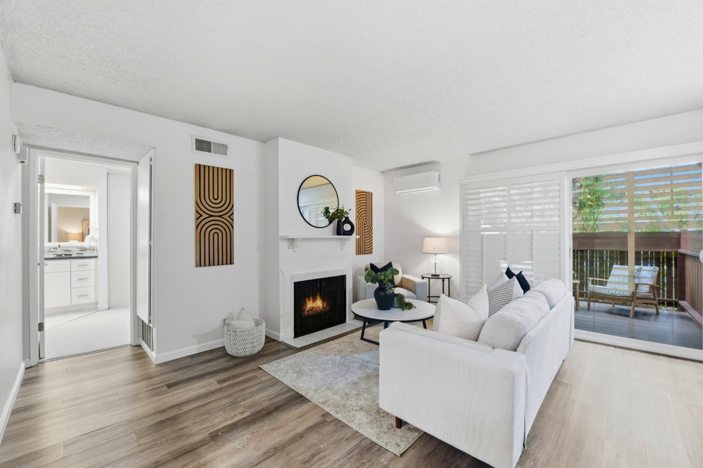1485 De Rose Way, Unit 123 San Jose, CA 95126 - Photo 2 of 21 a living room with furniture and a fireplace