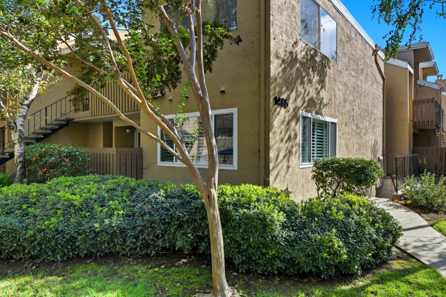 1485 De Rose Way, Unit 123 San Jose, CA 95126 - Photo 5 of 21 front view of a house with a yard
