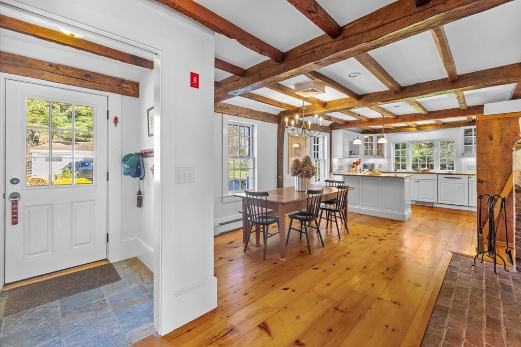 6 Rachael's Lane Duxbury, MA 02332 - Photo 15 of 42 a view of a dining room with furniture window and wooden floor