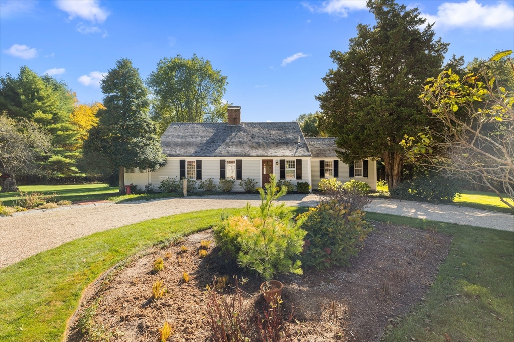 6 Rachael's Lane Duxbury, MA 02332 - Photo 2 of 42 a front view of a house with swimming pool having outdoor seating