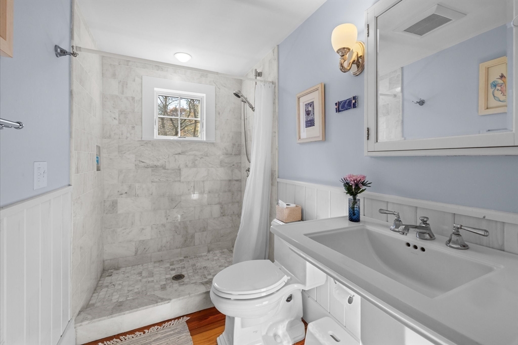 6 Rachael's Lane Duxbury, MA 02332 - Photo 21 of 42 a bathroom with a sink toilet and shower