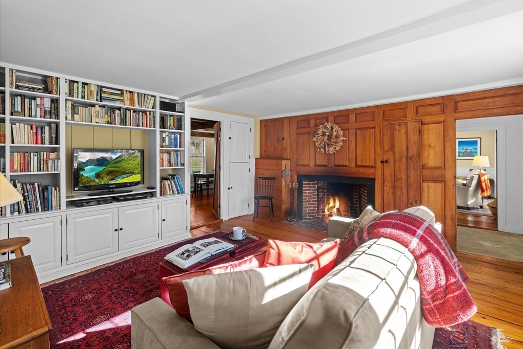 6 Rachael's Lane Duxbury, MA 02332 - Photo 23 of 42 a bedroom with a bed and a flat screen tv