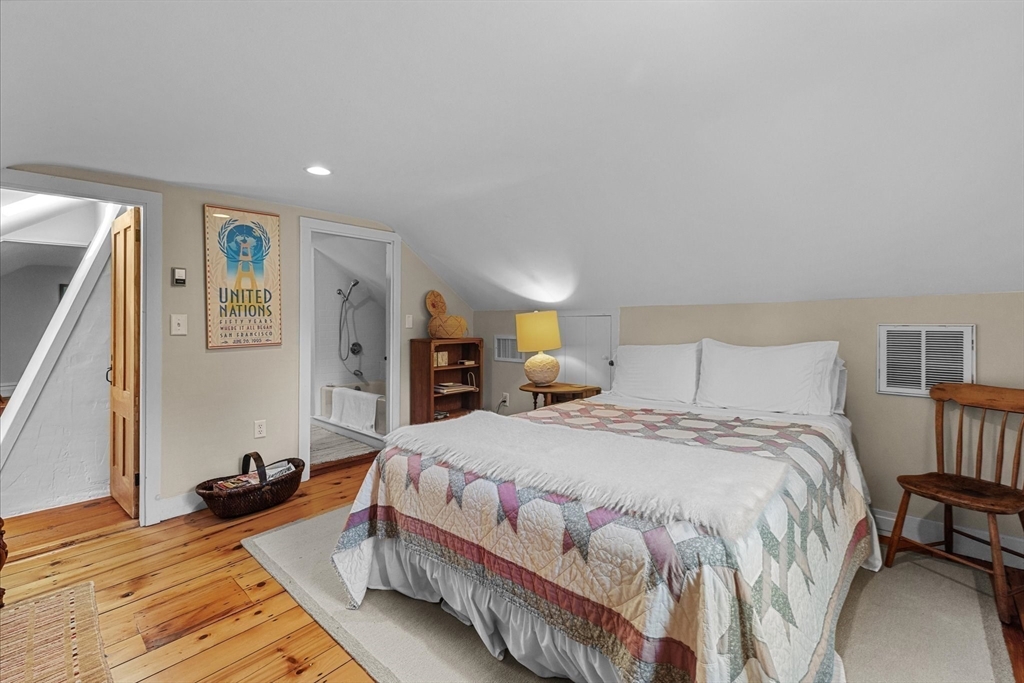 6 Rachael's Lane Duxbury, MA 02332 - Photo 26 of 42 a bedroom with a bed and a view of kitchen