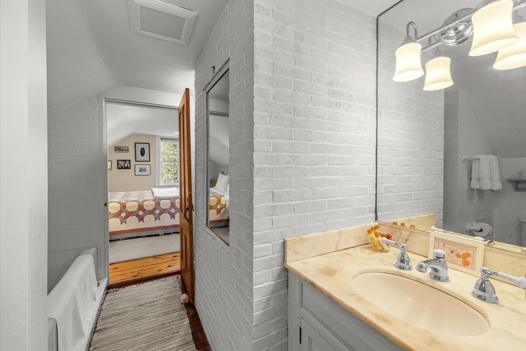 6 Rachael's Lane Duxbury, MA 02332 - Photo 28 of 42 a bathroom with a sink double vanity and shower