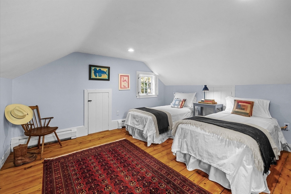 6 Rachael's Lane Duxbury, MA 02332 - Photo 29 of 42 a bedroom with two beds and painting on the wall