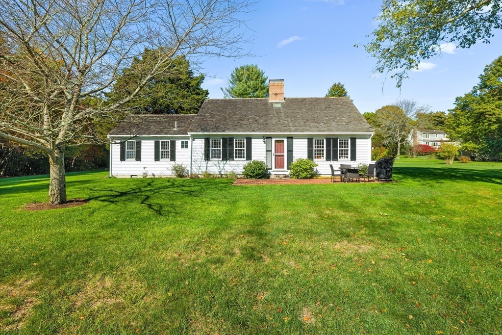 6 Rachael's Lane Duxbury, MA 02332 - Photo 4 of 42 front view of a house with a yard