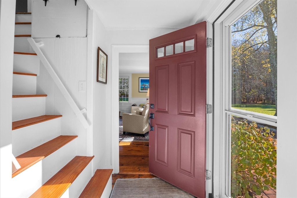 6 Rachael's Lane Duxbury, MA 02332 - Photo 5 of 42 a view of entryway and hall with wooden floor
