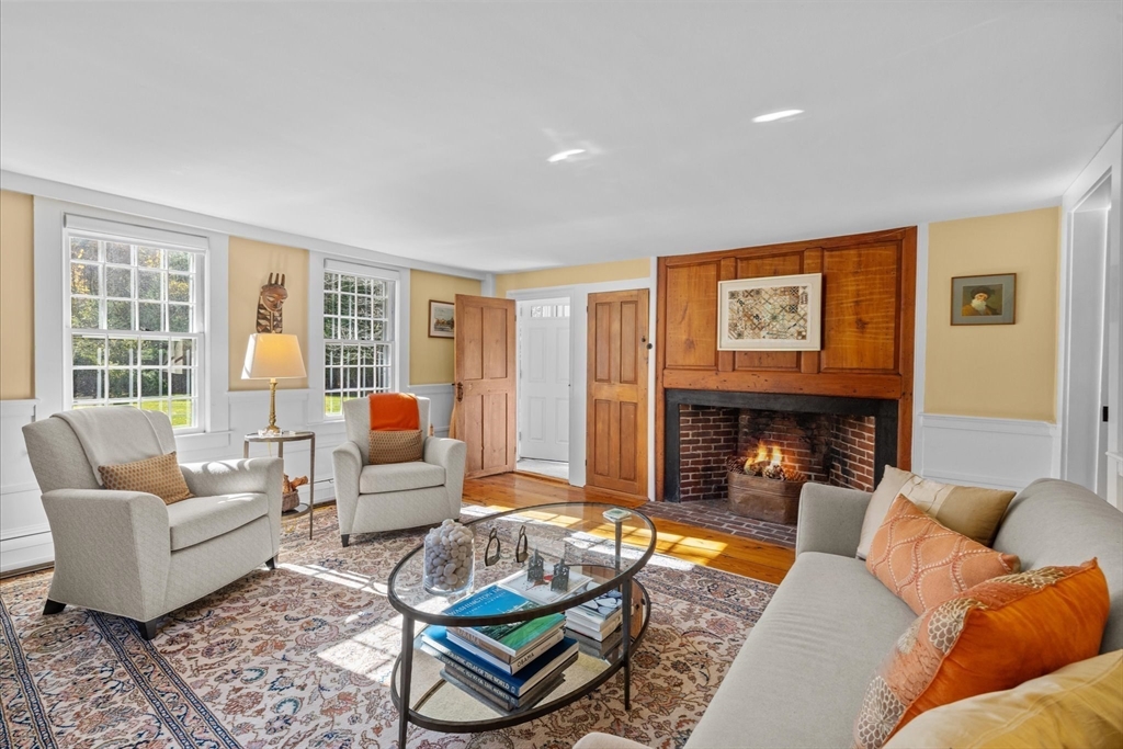 6 Rachael's Lane Duxbury, MA 02332 - Photo 7 of 42 a living room with furniture and a fireplace