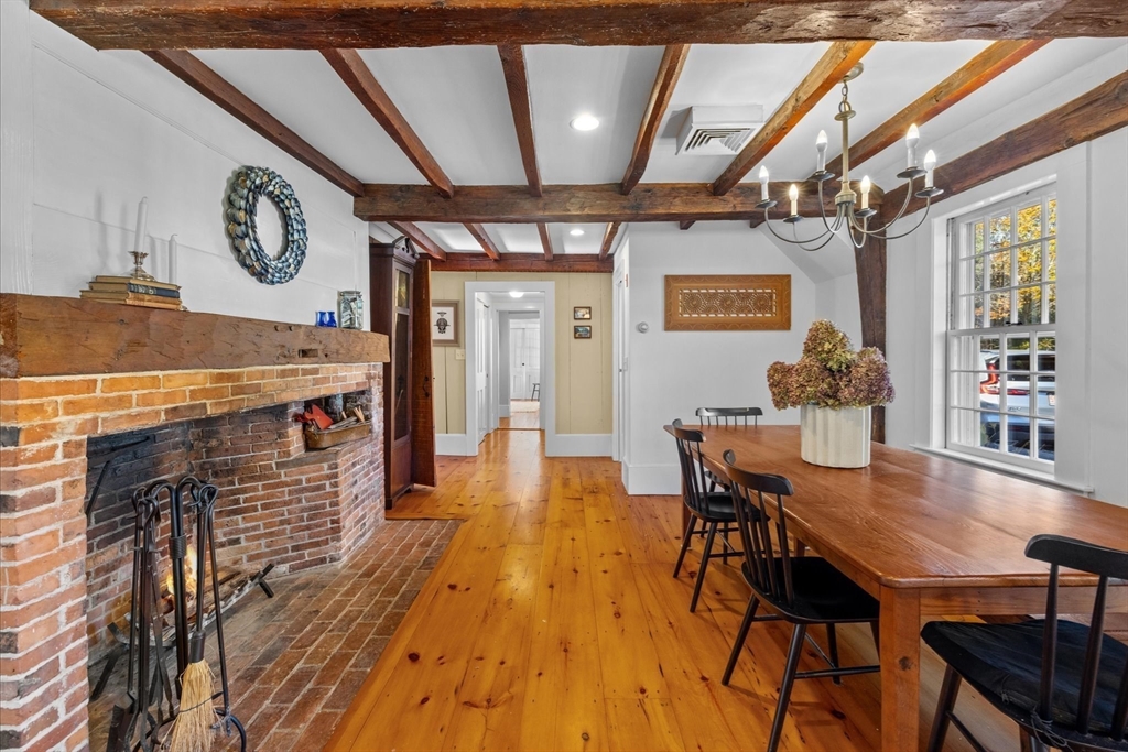 6 Rachael's Lane Duxbury, MA 02332 - Photo 8 of 42 a view of a dining room with furniture window and wooden floor