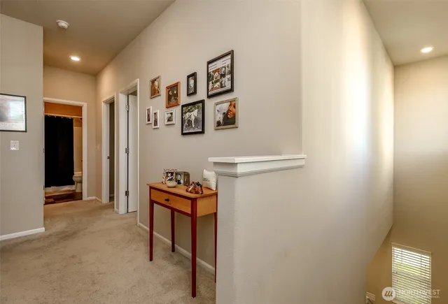 a view of a hallway with front door