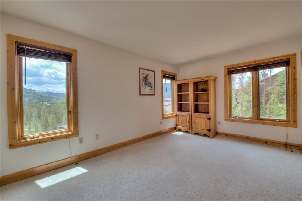 482 Idlewild Drive Dillon, CO 80435 - Photo 18 of 35 an empty room with windows