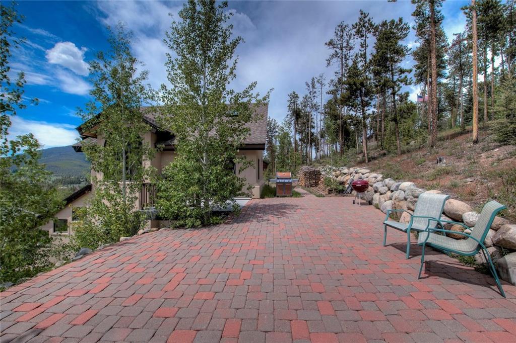 482 Idlewild Drive Dillon, CO 80435 - Photo 28 of 35 a view of backyard with outdoor seating and trees