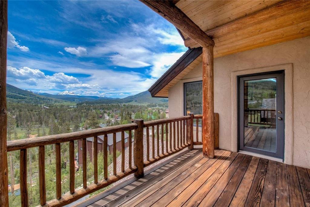 482 Idlewild Drive Dillon, CO 80435 - Photo 8 of 35 a view of a balcony with wooden floor and fence