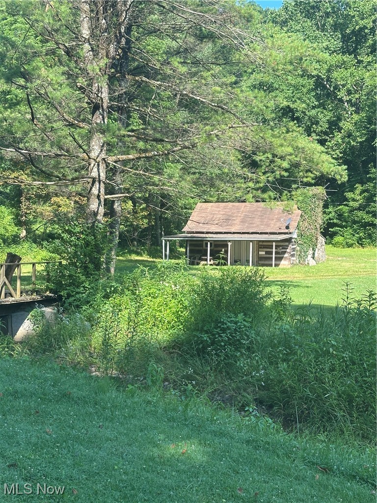 37114 Barber Ridge Road Woodsfield, OH 43793 - Photo 1 of 50 View of grassy yard with a view of trees