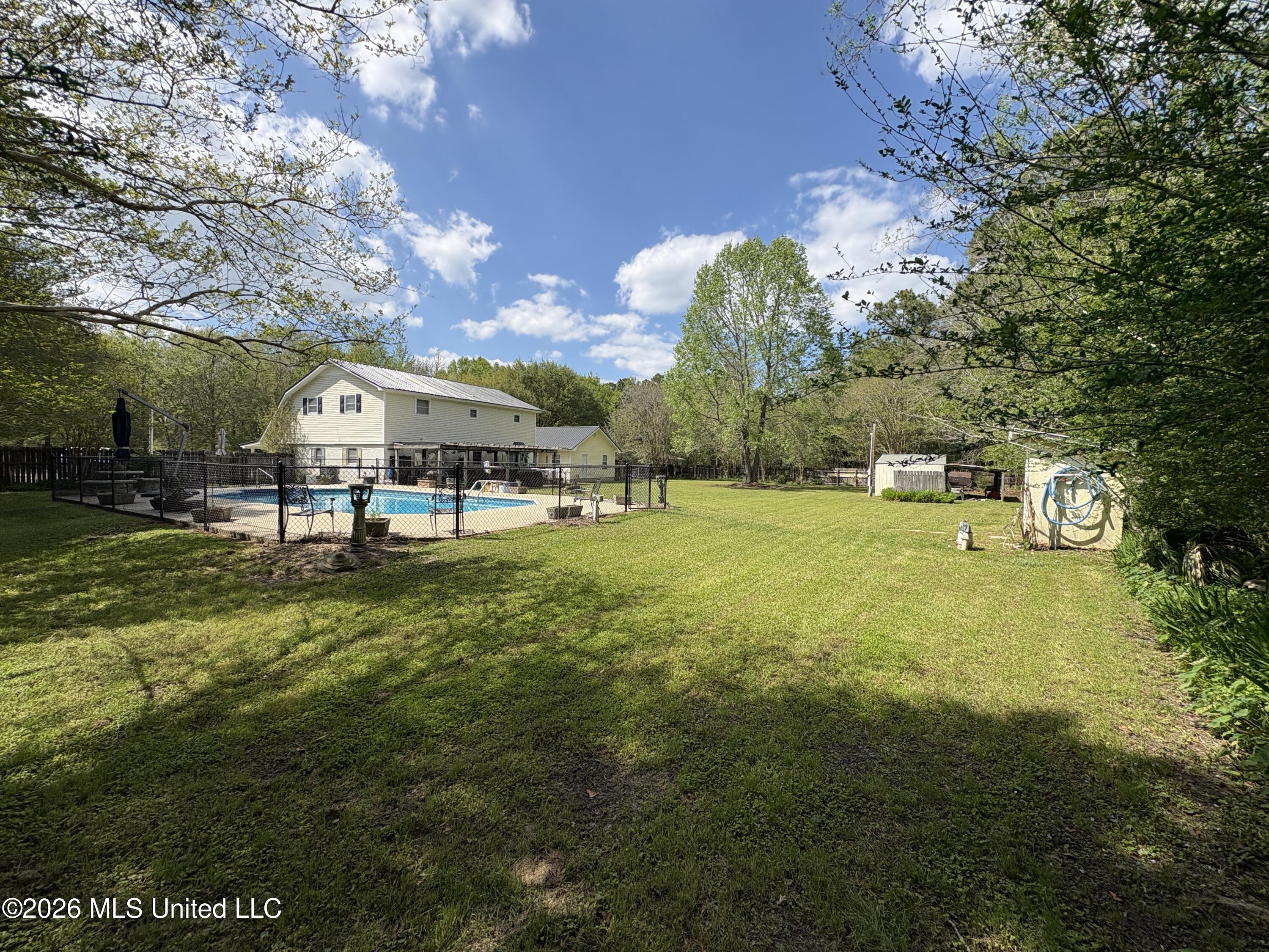 13704 Coleman Street Moss Point, MS 39562 - Photo 40 of 50 Backyard with pool view