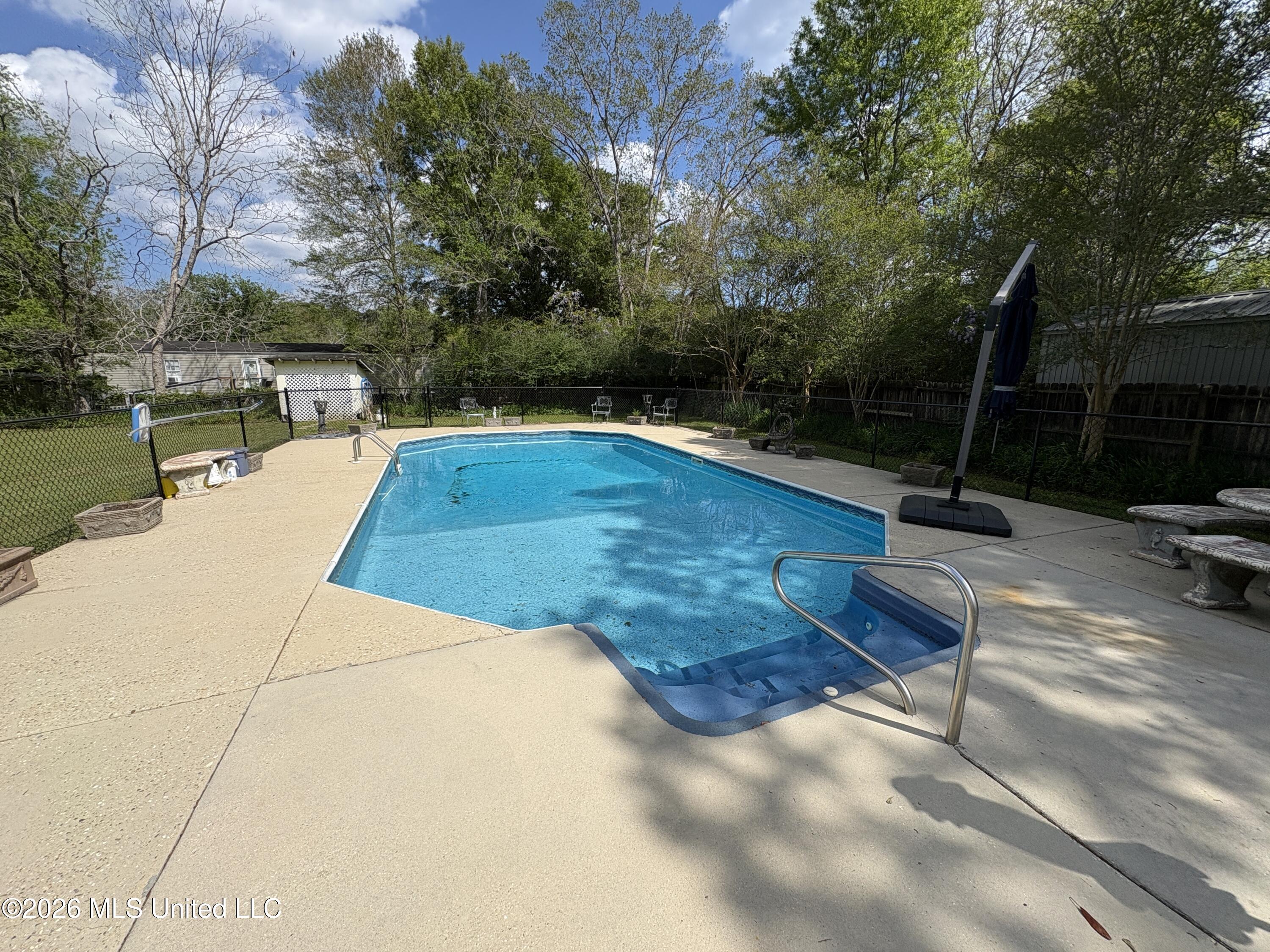 13704 Coleman Street Moss Point, MS 39562 - Photo 42 of 50 Inground Pool Steps