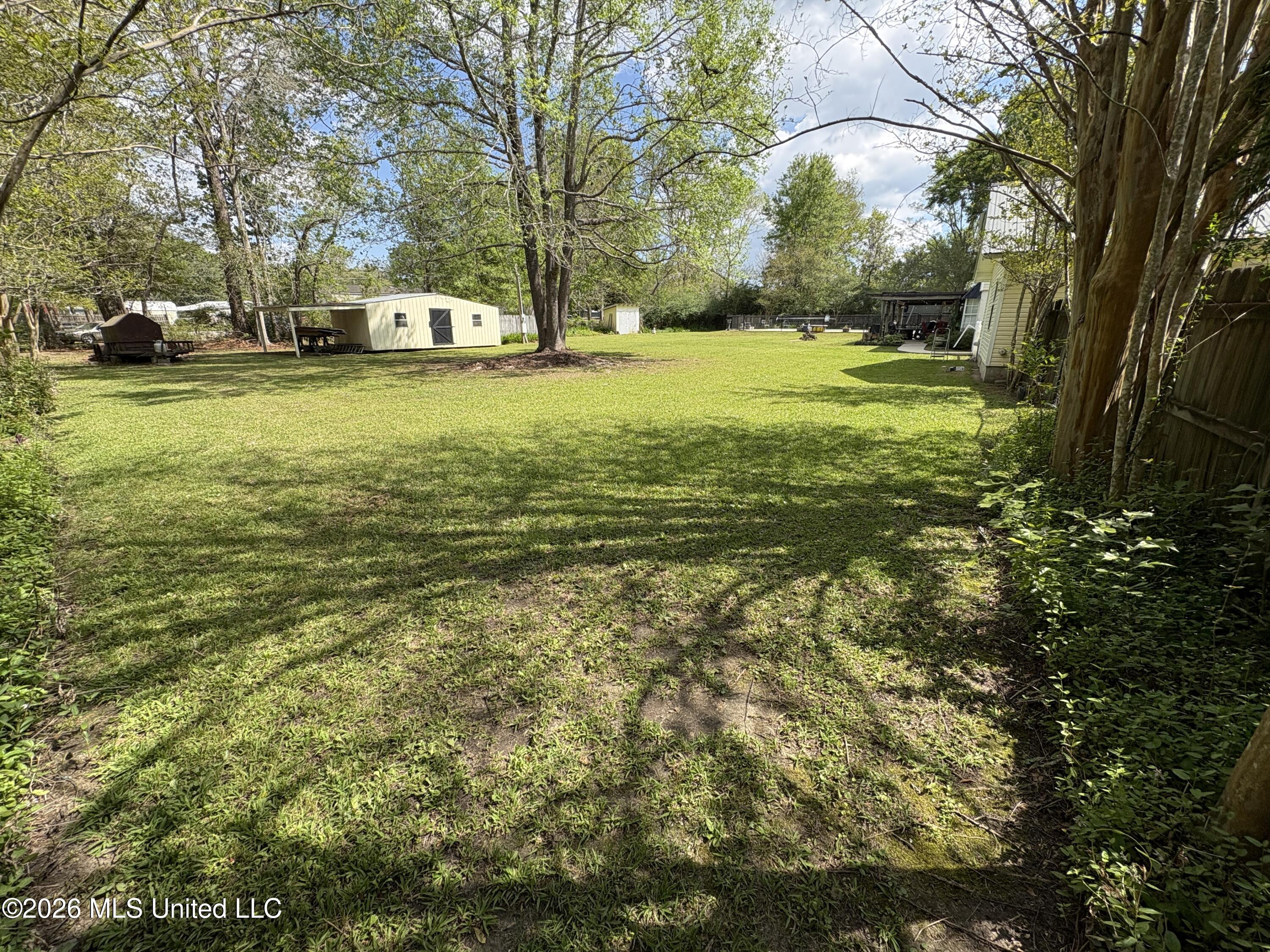 13704 Coleman Street Moss Point, MS 39562 - Photo 46 of 50 Backyard with Shed