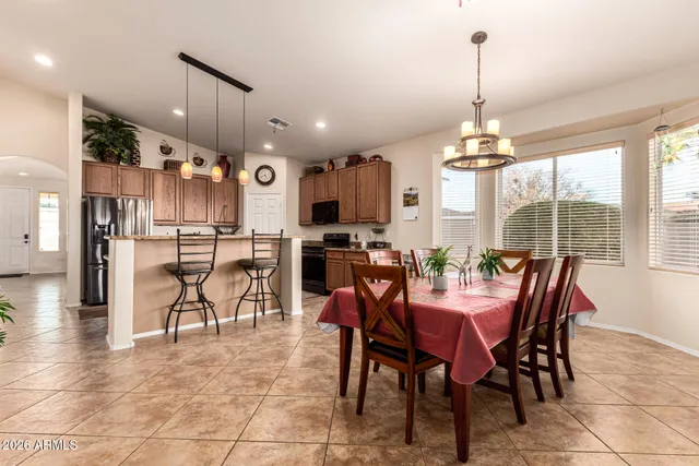 a view of a dining room with furniture