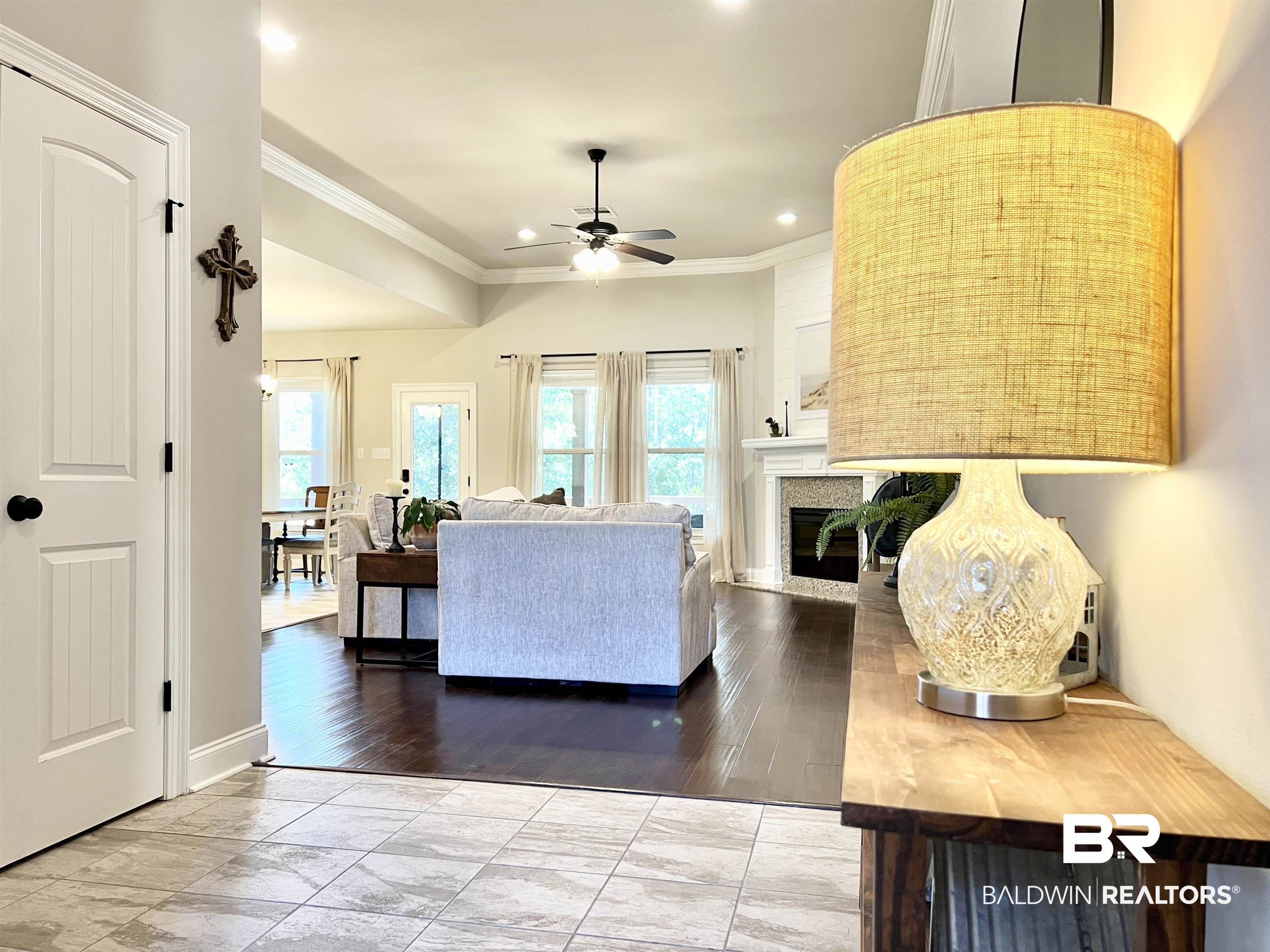 32290 Calder Court Daphne, AL 36527 - Photo 7 of 59 Living room featuring hardwood / wood-style floors, crown molding, and ceiling fan