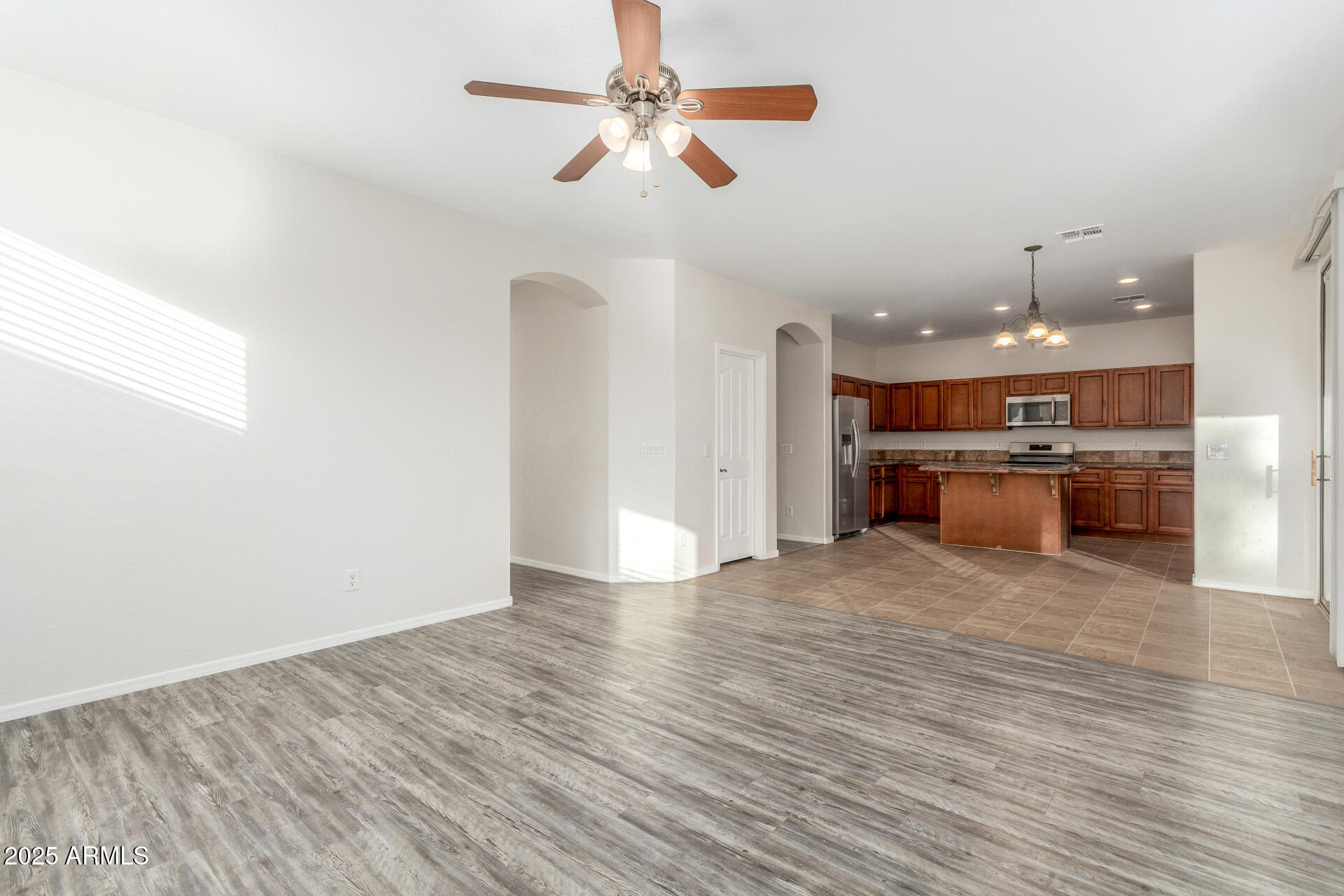 8849 West Cordes Road Tolleson, AZ 85353 - Photo 9 of 33 a view of kitchen with stove and cabinets