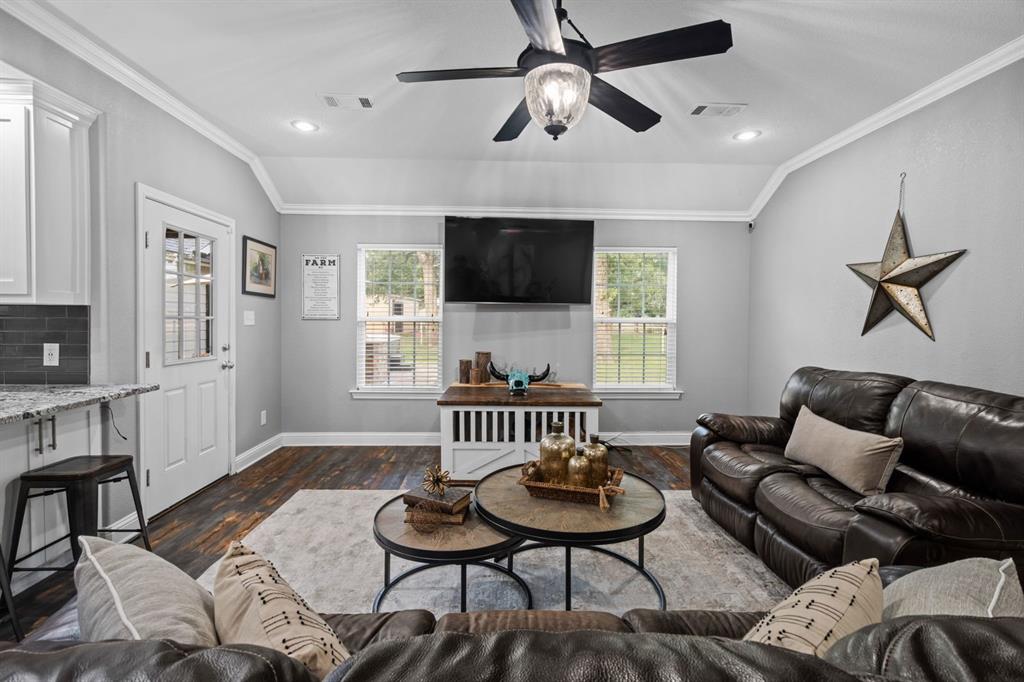 175 Porter Road Bartonville, TX 76226 - Photo 15 of 40 a living room with furniture a flat screen tv and a window