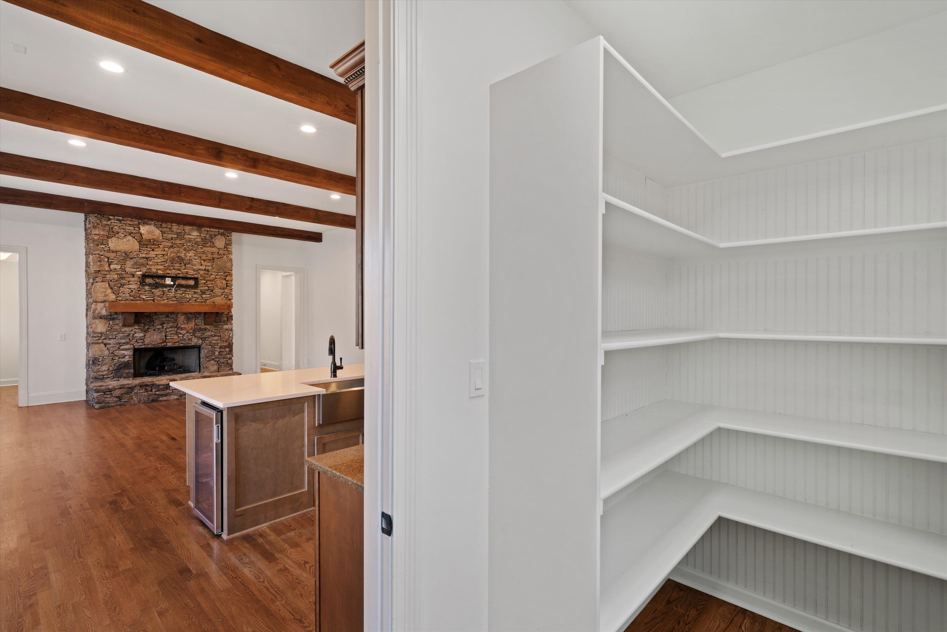 1247 Braywind Drive Collierville, TN 38017 - Photo 12 of 35 a view of a kitchen with furniture and wooden floor