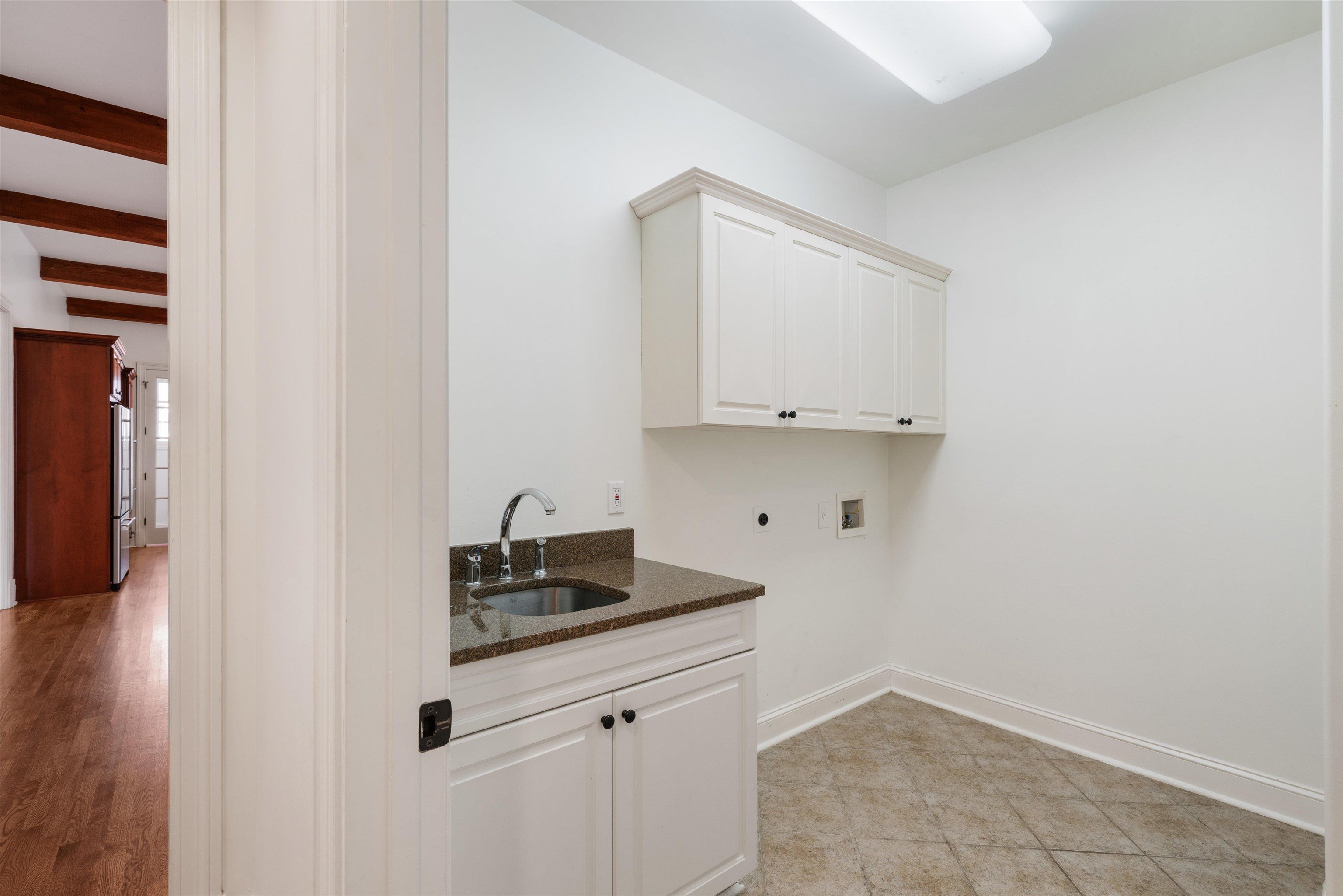 1247 Braywind Drive Collierville, TN 38017 - Photo 15 of 35 a kitchen with a sink and cabinets