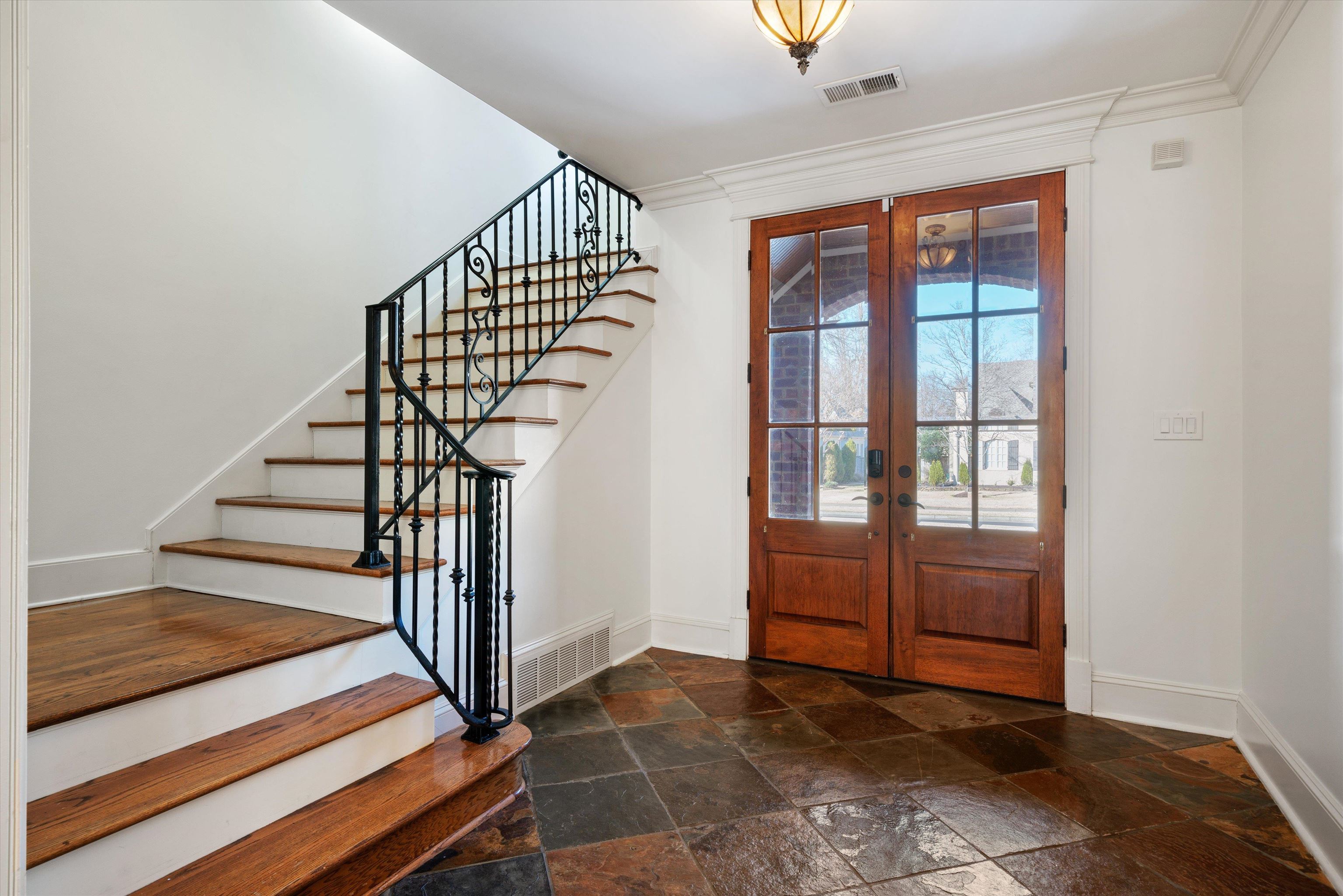 1247 Braywind Drive Collierville, TN 38017 - Photo 23 of 35 a view of entryway and hall with wooden floor