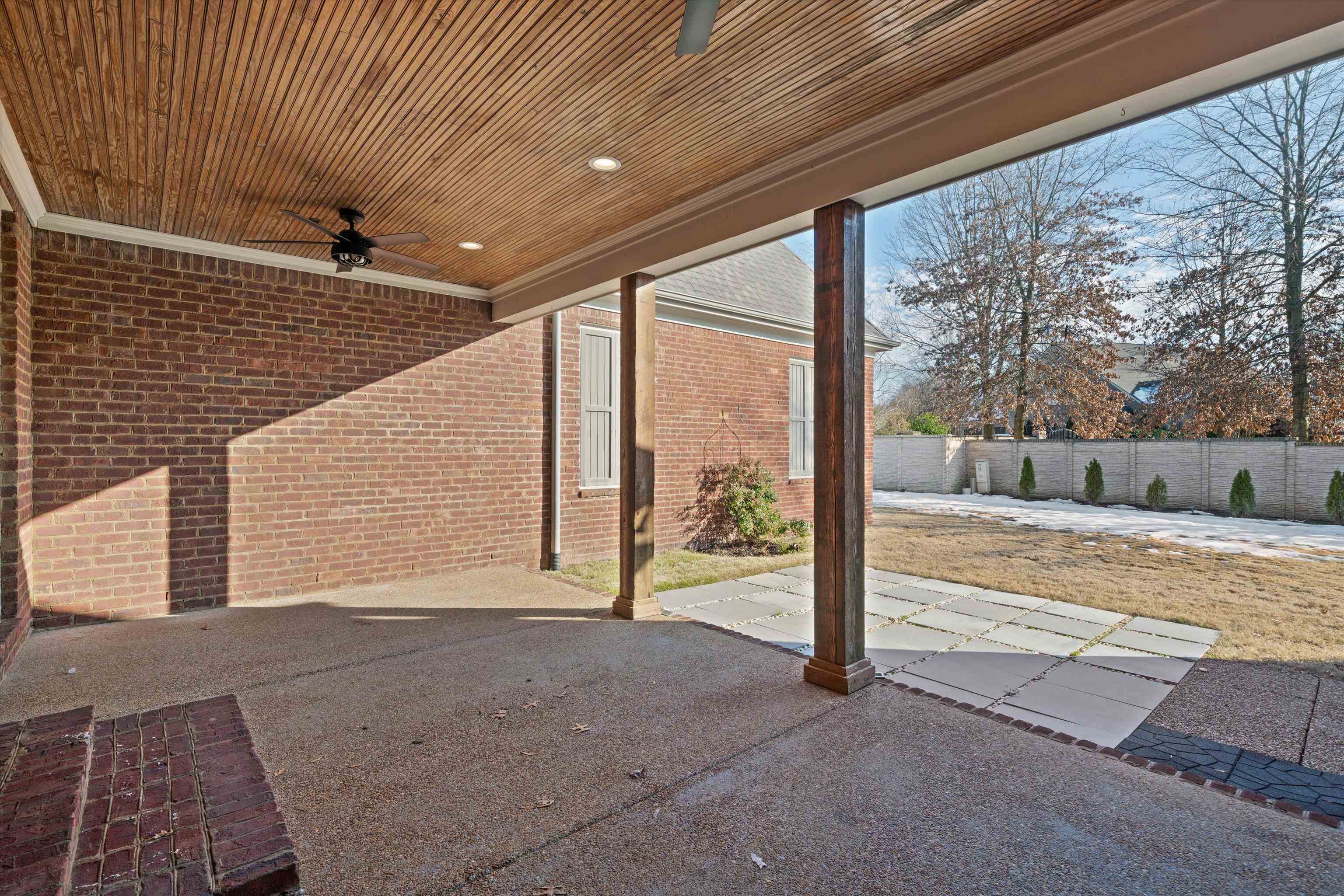 1247 Braywind Drive Collierville, TN 38017 - Photo 32 of 35 a view of a room with wooden floor and fence