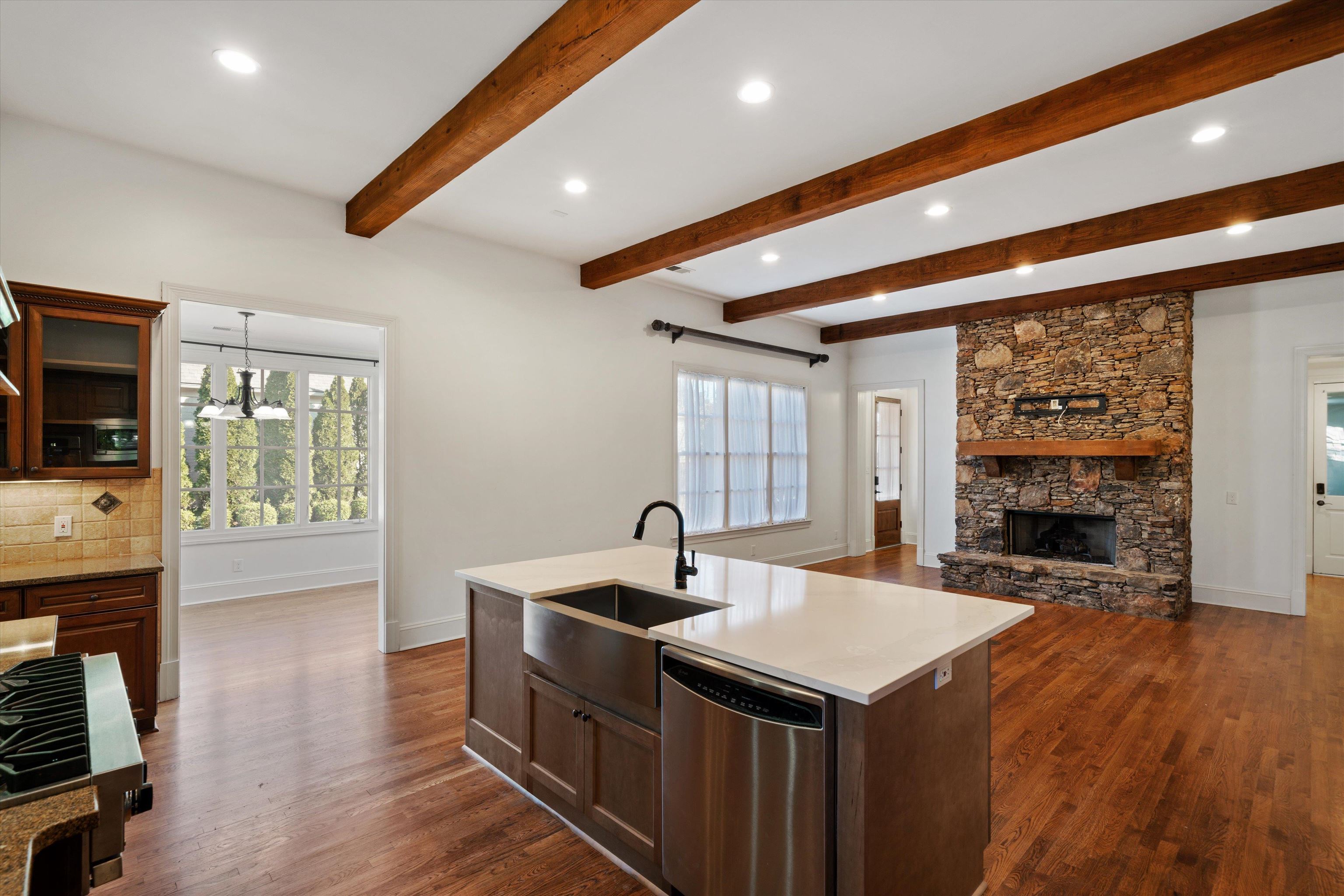 1247 Braywind Drive Collierville, TN 38017 - Photo 7 of 35 a kitchen with a sink and wooden floor