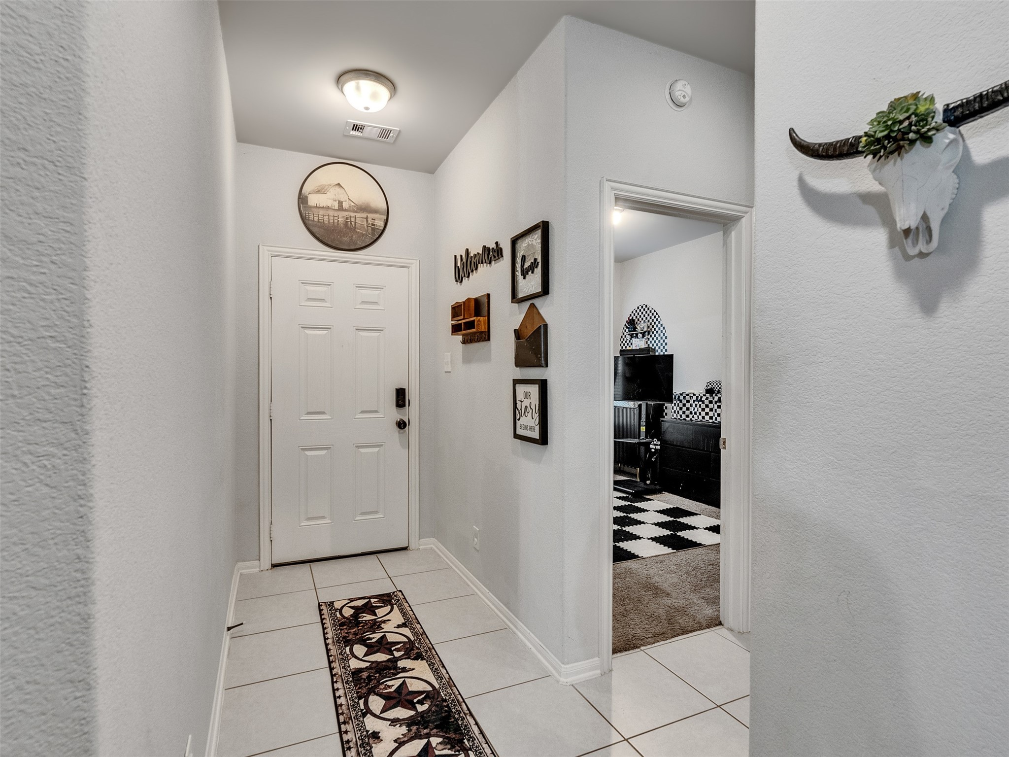 8719 Willet Street Baytown, TX 77521 - Photo 5 of 42 a view of a hallway with elevator