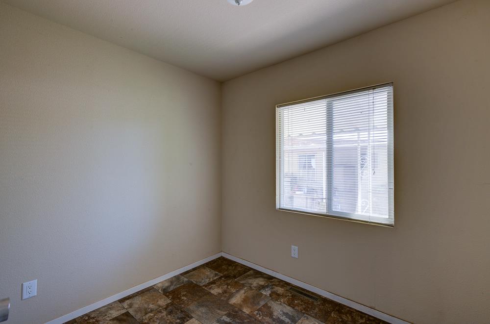 1218 East Cleveland Avenue, Unit 19 Madera, CA 93638 - Photo 13 of 18 a small space with a window