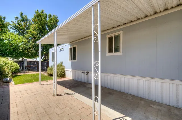 a house with garden in front of it