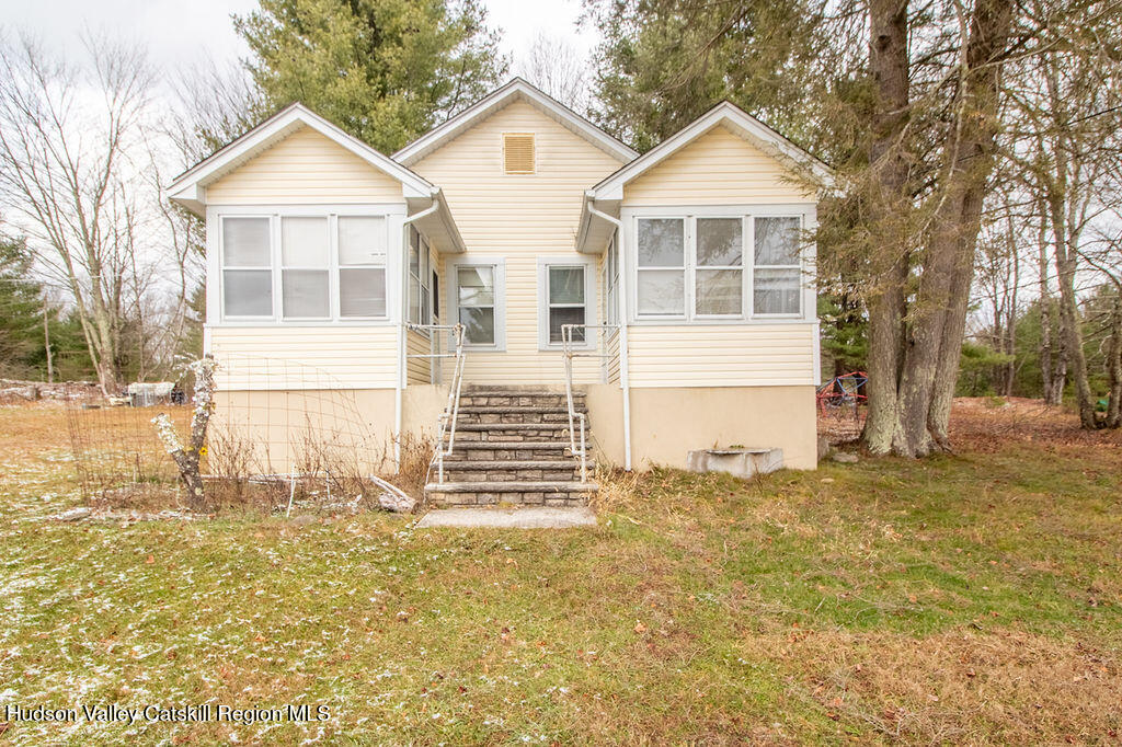 224 Camp Road Ellenville, NY 12428 - Photo 25 of 50 a front view of a house with a yard